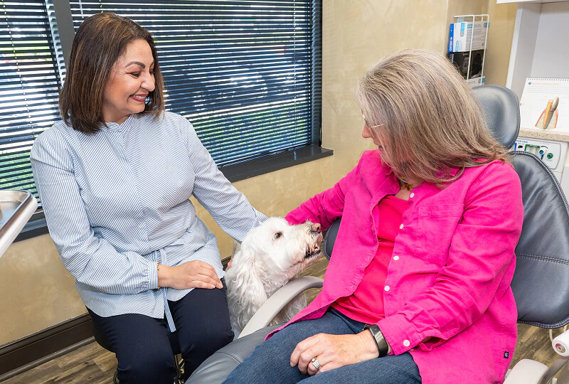 woman enjoying her visit to Brentwood Dental Excellence