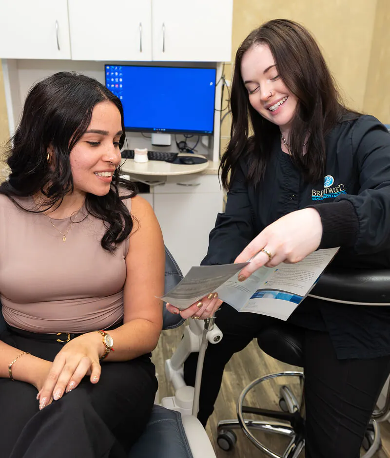 discussing dental financing with a patient at Brentwood Dental Excellence