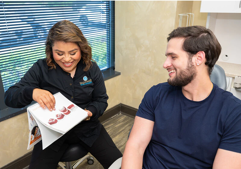 discussing restorative options at Brentwood Dental Excellence