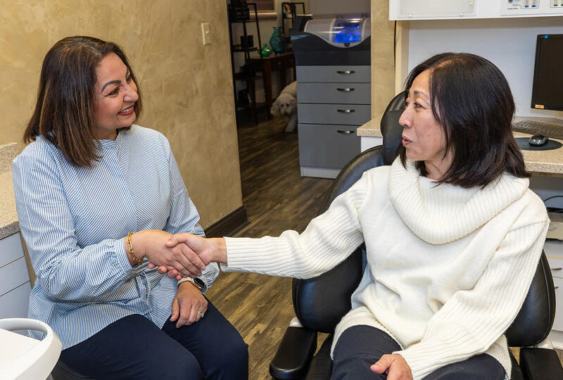 woman smiling during her visit to Brentwood Dental Excellence